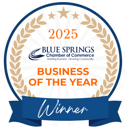 A badge that states "2025 blue springs chamber of commerce business of the year"
