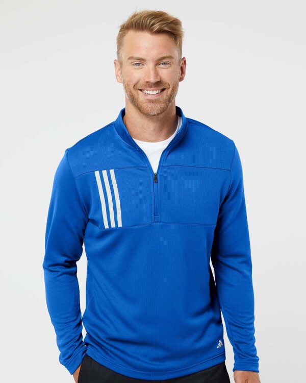 Adidas mens 3-Stripes Double Knit Quarter-Zip Pullover in royal blue.