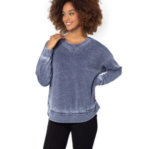 Model wearing Ink chicka-d Ladies' Burnout Campus Pullover.