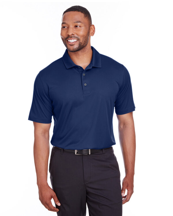 Model wearing Peacoat Puma Golf Men's Icon Golf Polo - 596799